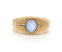 A Yellow Gold, Star Sapphire and Diamond Ring, 6.50 dwts.