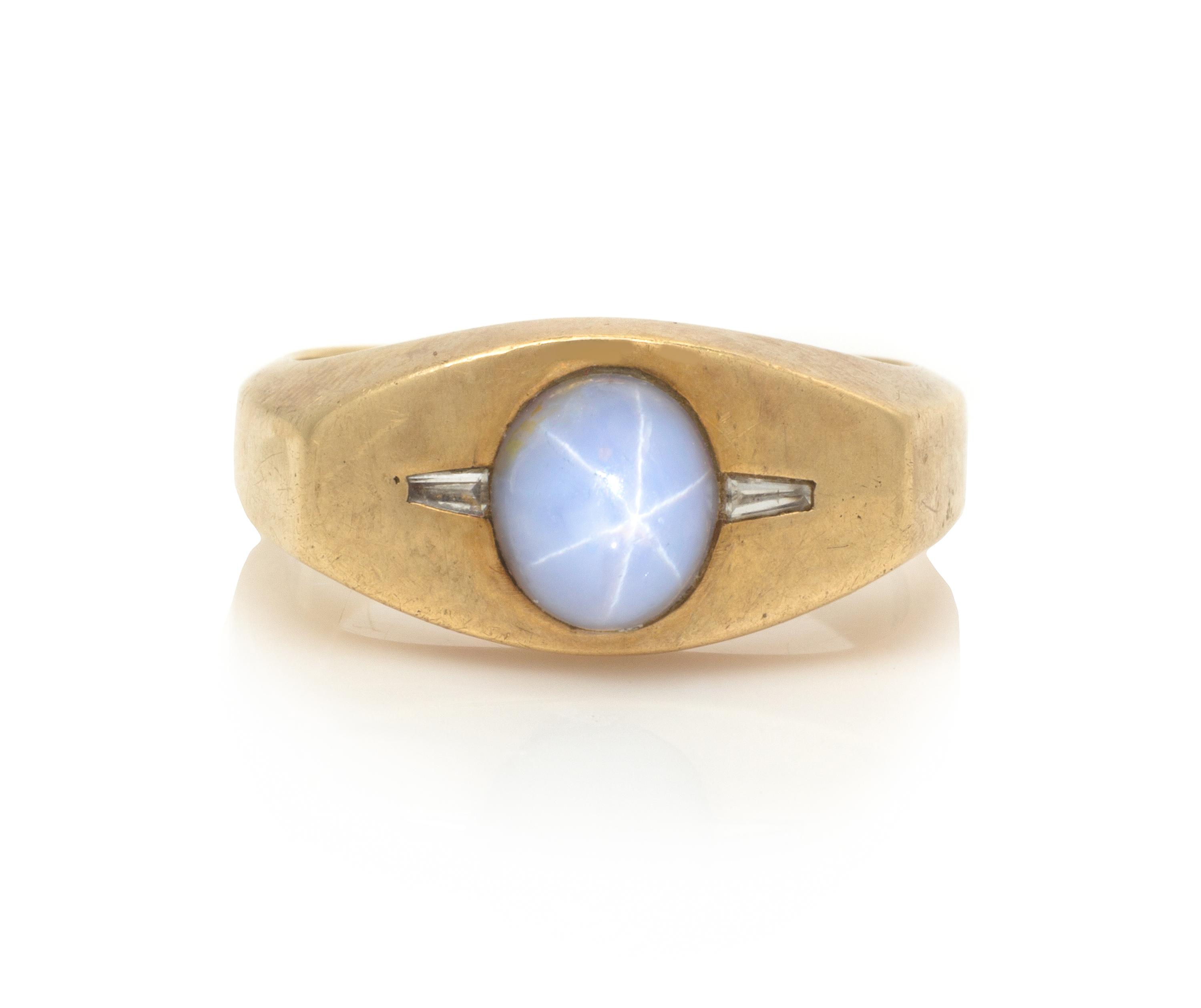 A Yellow Gold, Star Sapphire and Diamond Ring, 6.50 dwts.