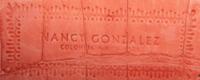 Nancy Gonzalez, Three Handbags