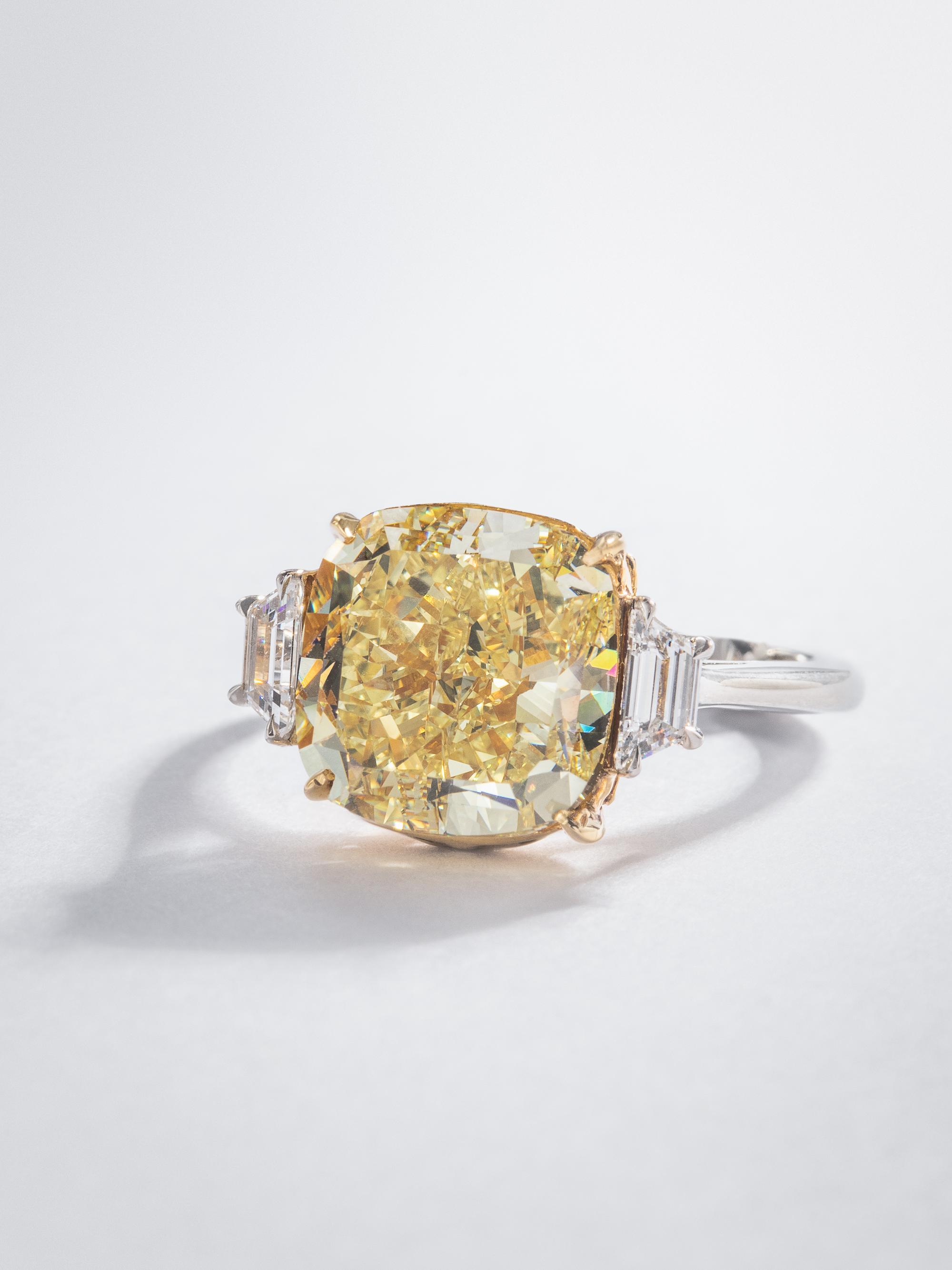 FOREVERMARK, FANCY YELLOW DIAMOND AND DIAMOND RING