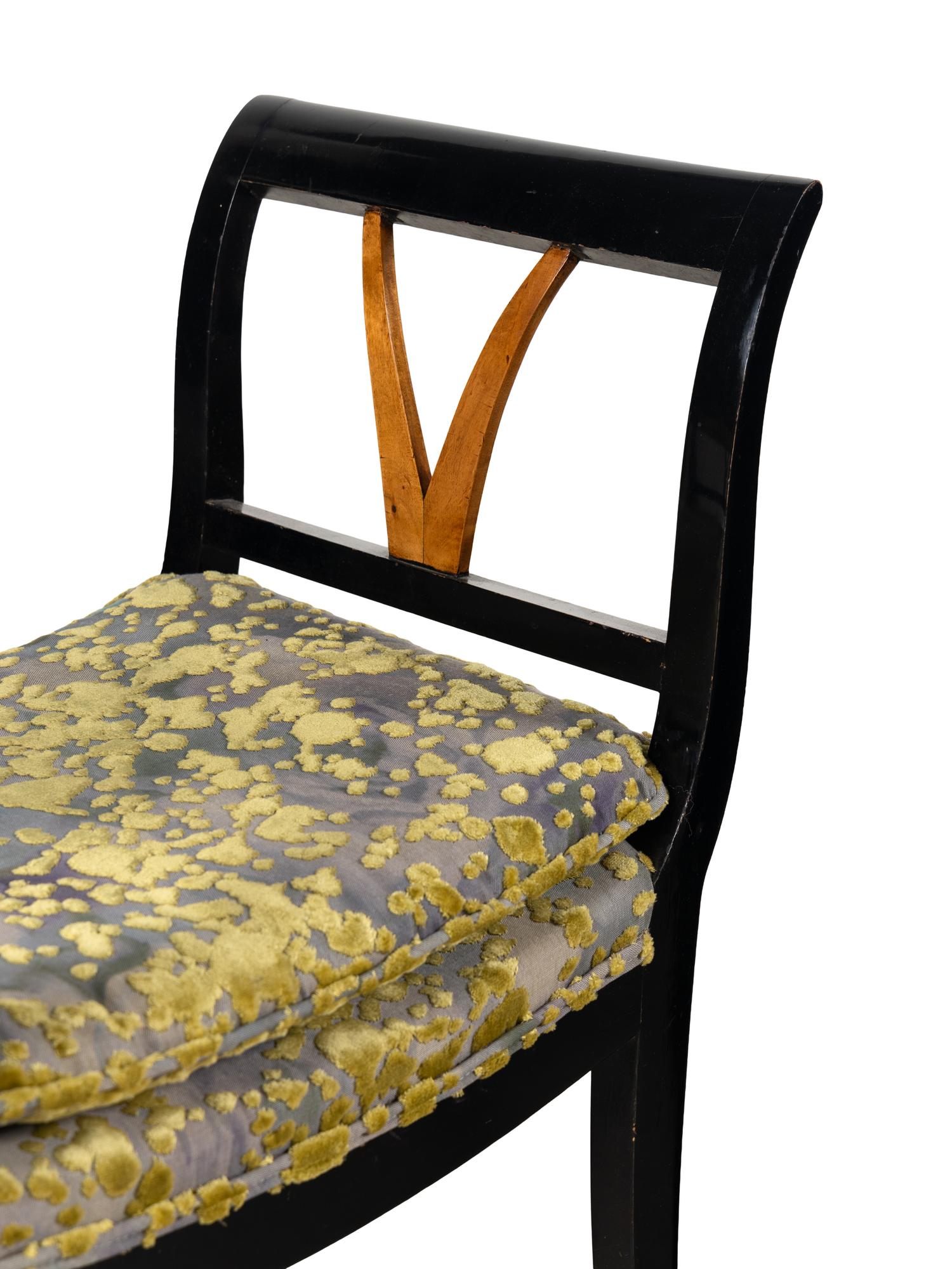 A Pair of Neoclassical Ebonized Curule Benches