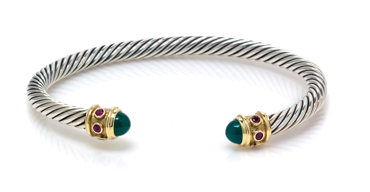 A Sterling Silver, 14 Karat Yellow Gold, Green Onyx and Garnet "Renaissance" Bracelet, David Yurman, 19.10 dwts.