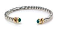A Sterling Silver, 14 Karat Yellow Gold, Green Onyx and Garnet "Renaissance" Bracelet, David Yurman, 19.10 dwts.