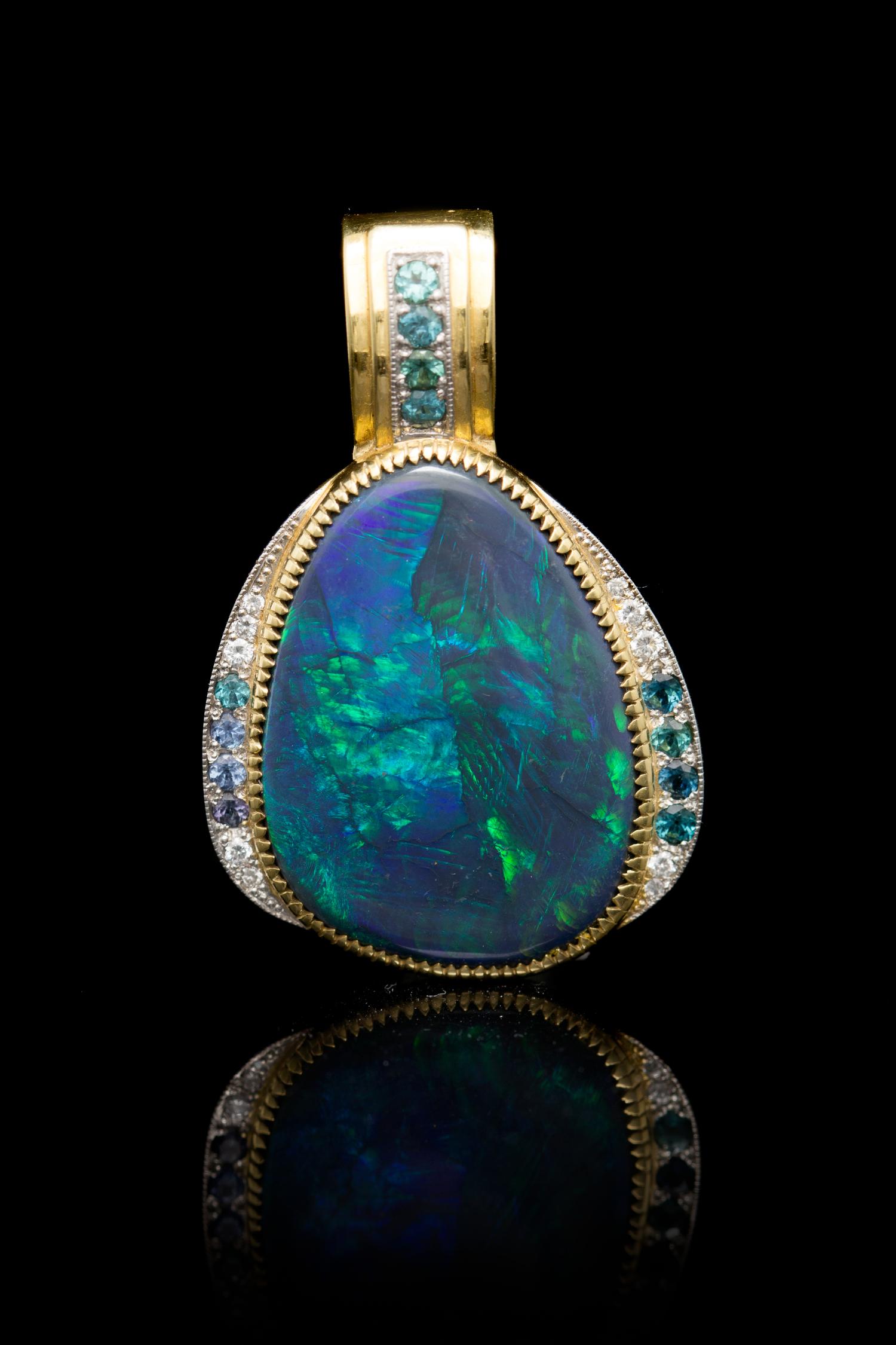 An 18 Karat Yellow Gold, Platinum, Black Opal, Diamond and Cuprian Tourmaline Pendant,