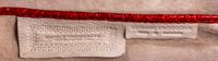 A Nancy Gonzalez Red Crocodile Clutch, 10.75" x 4.5" x 2".