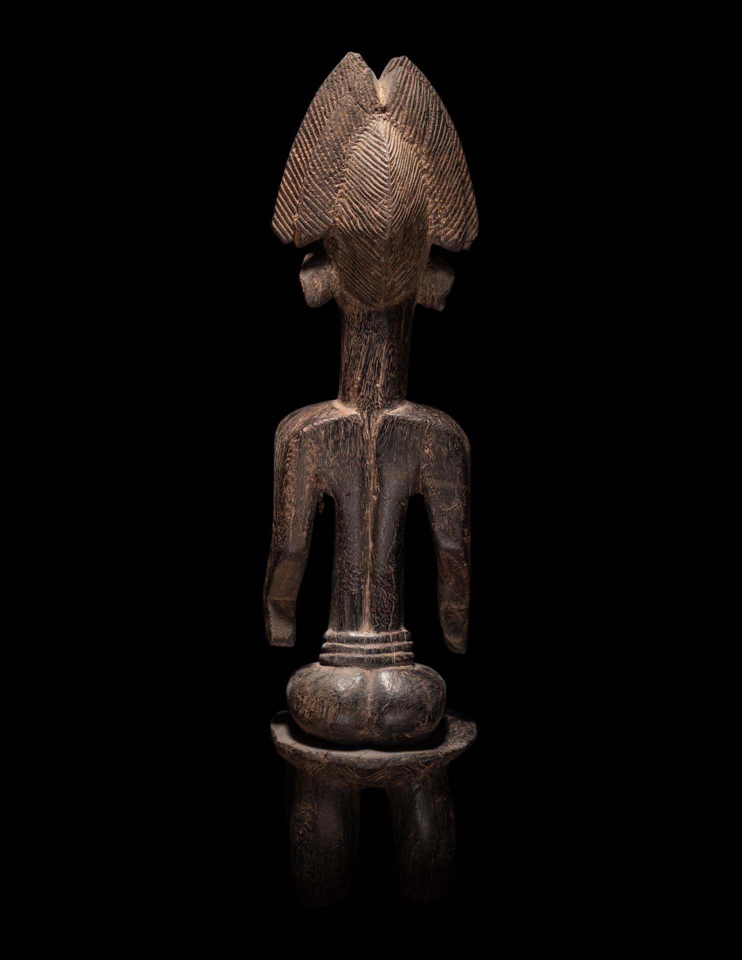 An African Carved Wood Figure