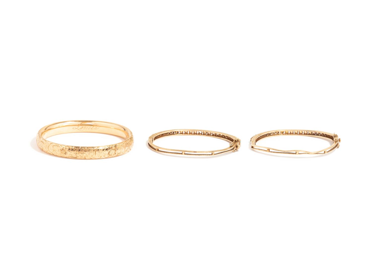 COLLECTION OF YELLOW GOLD BANGLE BRACELETS