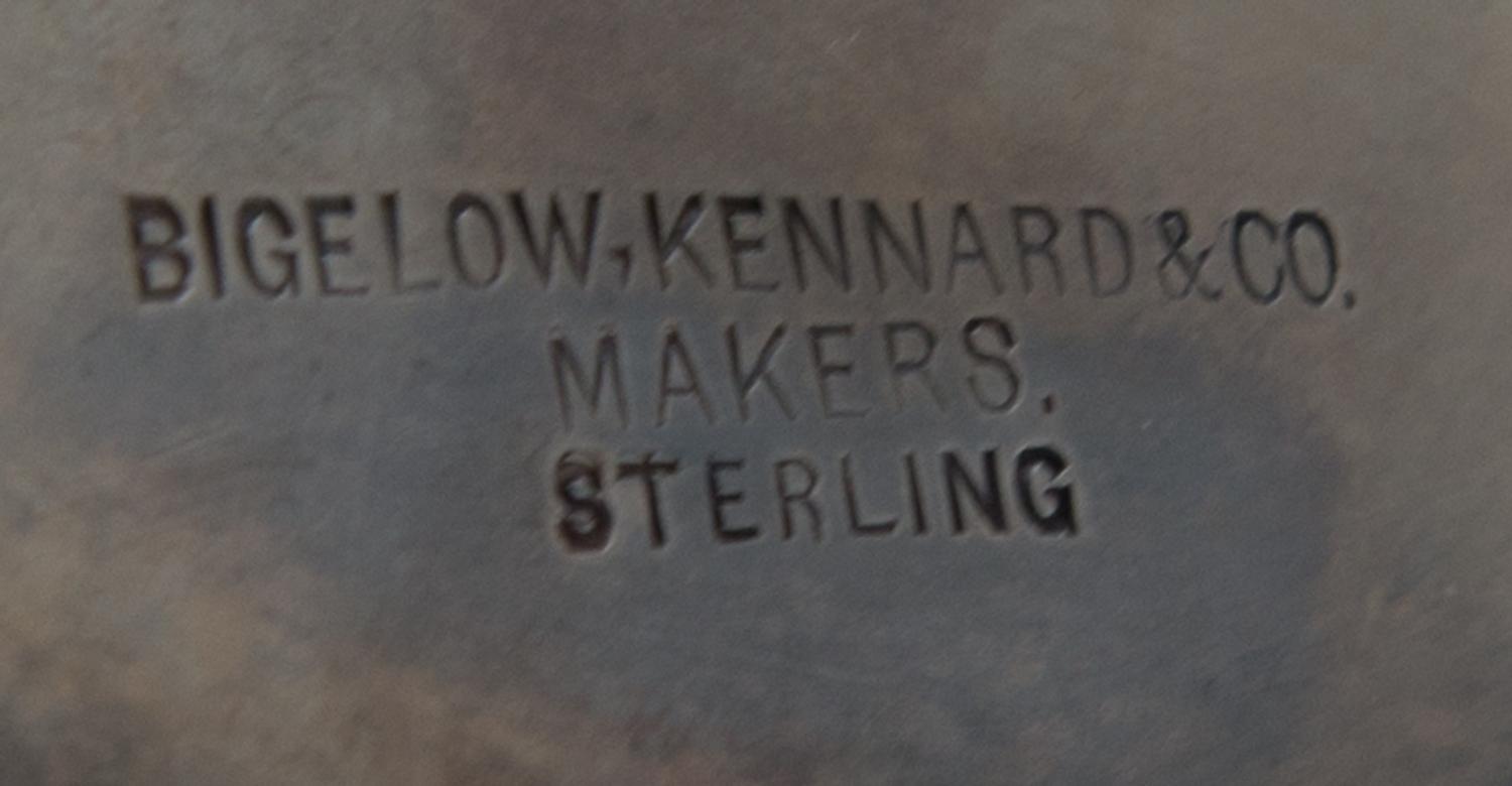 An American Silver Water Pitcher, Bigelow, Kennard & Co., Boston, MA, having a rounded body with a cylindrical neck, with floral and fo
