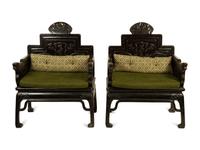 A Pair of Chinese Carved Hardwood Armchairs — 20TH CENTURY