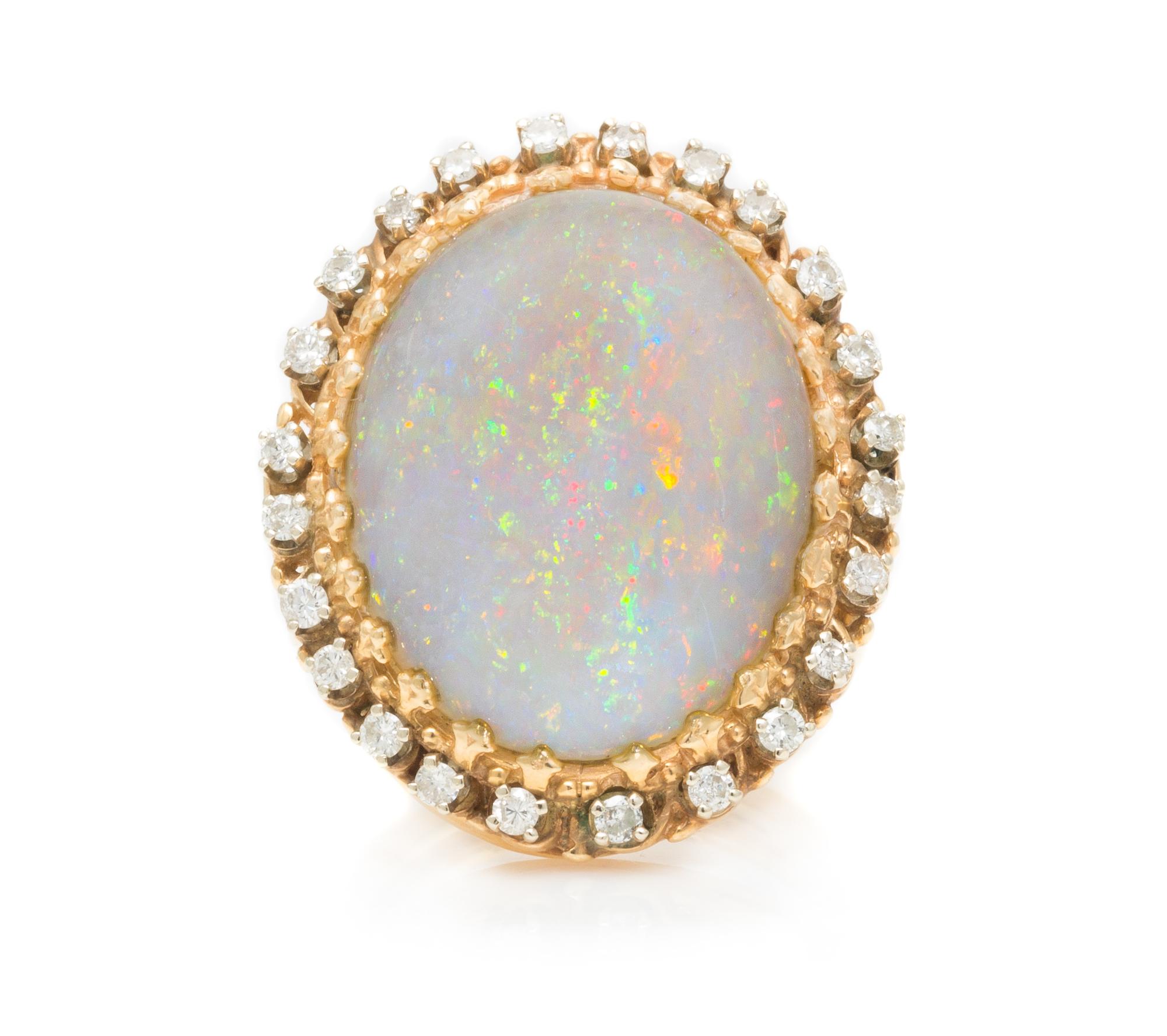 A Yellow Gold, Opal and Diamond Ring, 9.30 dwts.