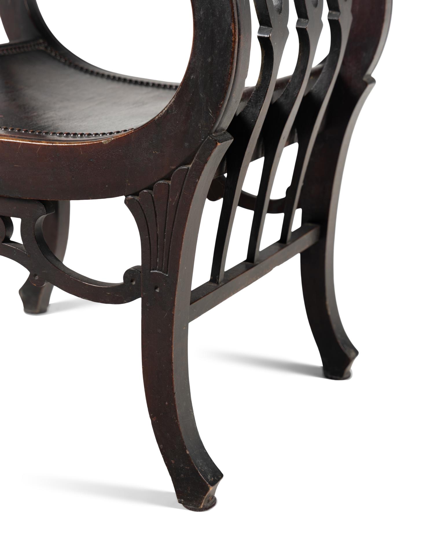 An American Victorian Carved Curule Chair