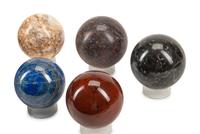 A Set of Nine Specimen Marble Spherical Ornaments