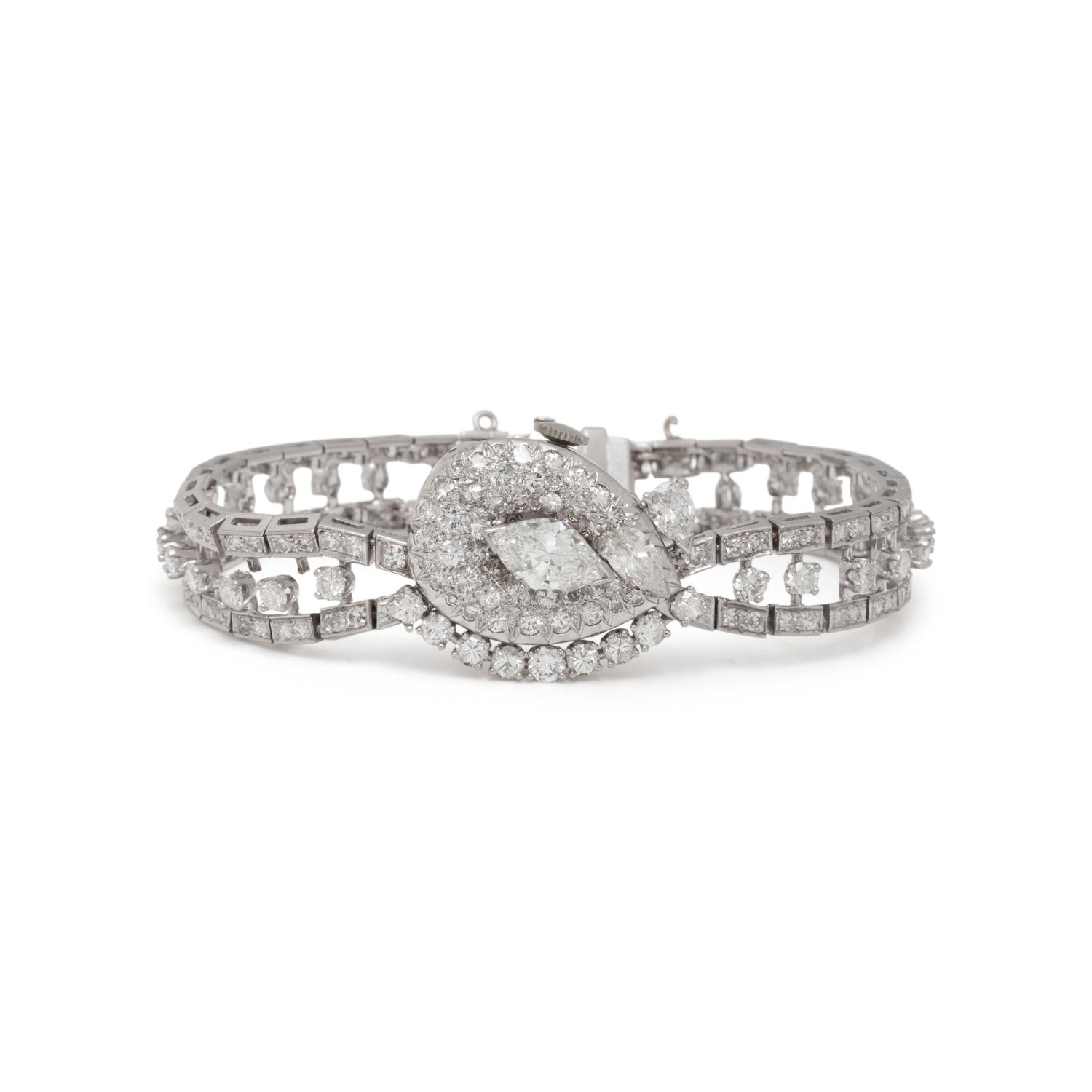 HAMILTON, PLATINUM AND DIAMOND SURPRISE WATCH