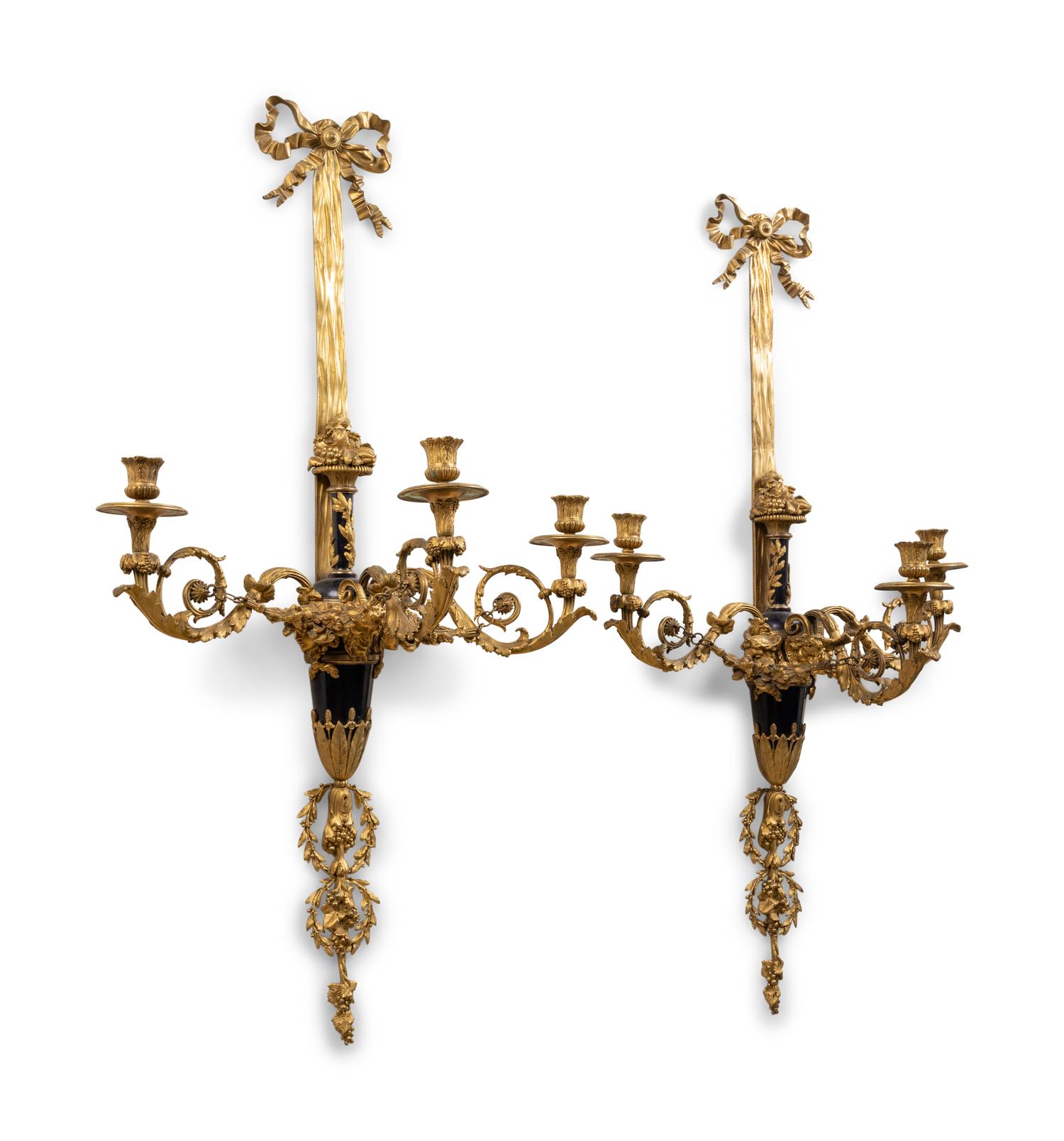 A Pair of Louis XVI Style Gilt Bronze Three-Light Wall Sconces