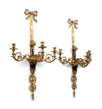 A Pair of Louis XVI Style Gilt Bronze Three-Light Wall Sconces