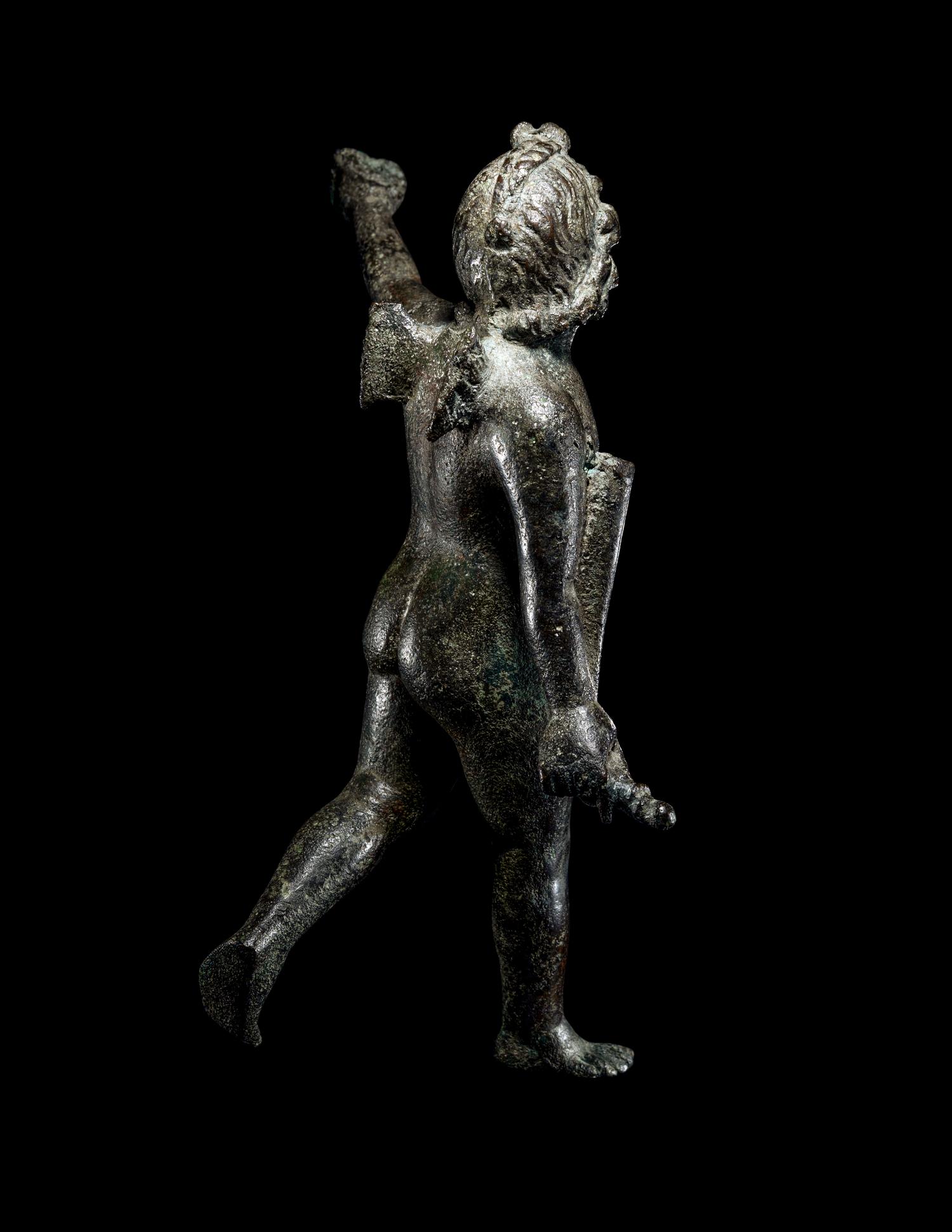 A Roman Bronze Nude Winged Eros