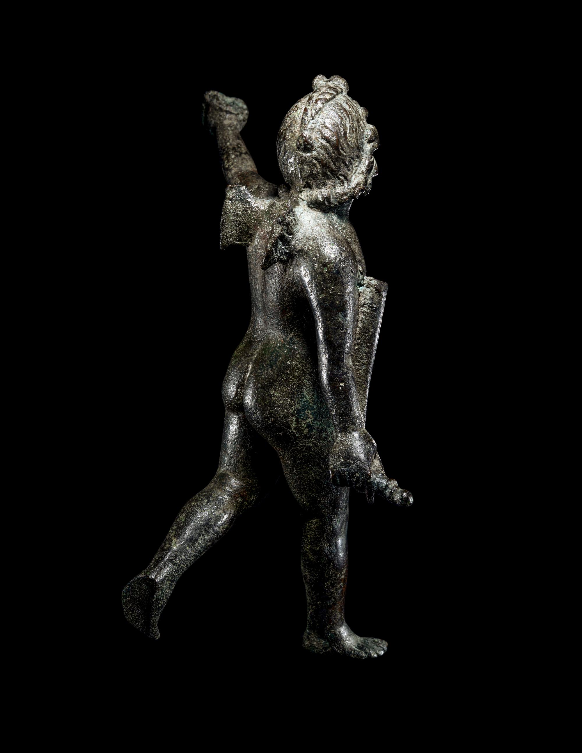 A Roman Bronze Nude Winged Eros