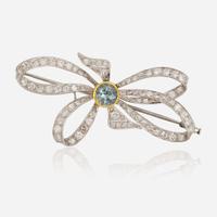A Platinum, Diamond, and Blue Zircon Brooch