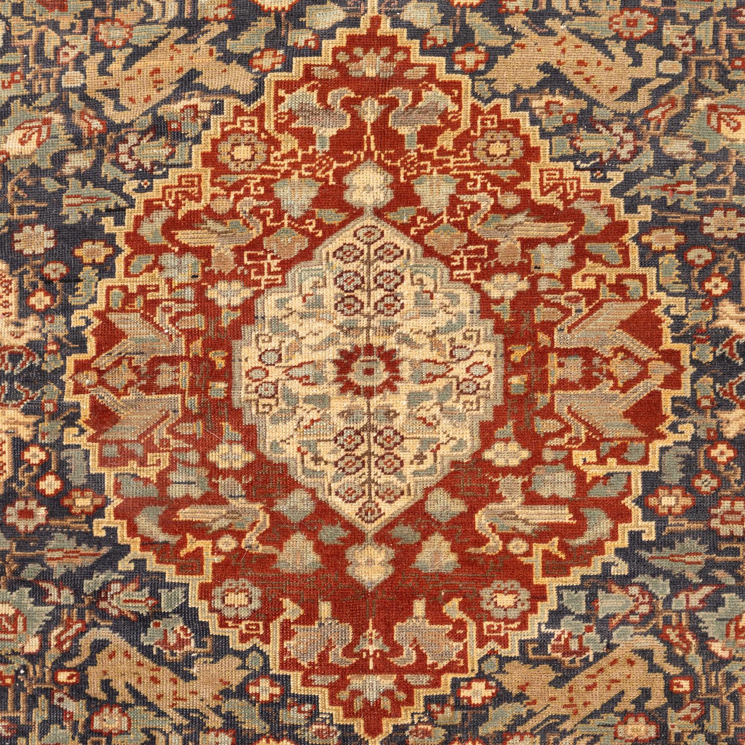 A Persian Wool and Silk Rug