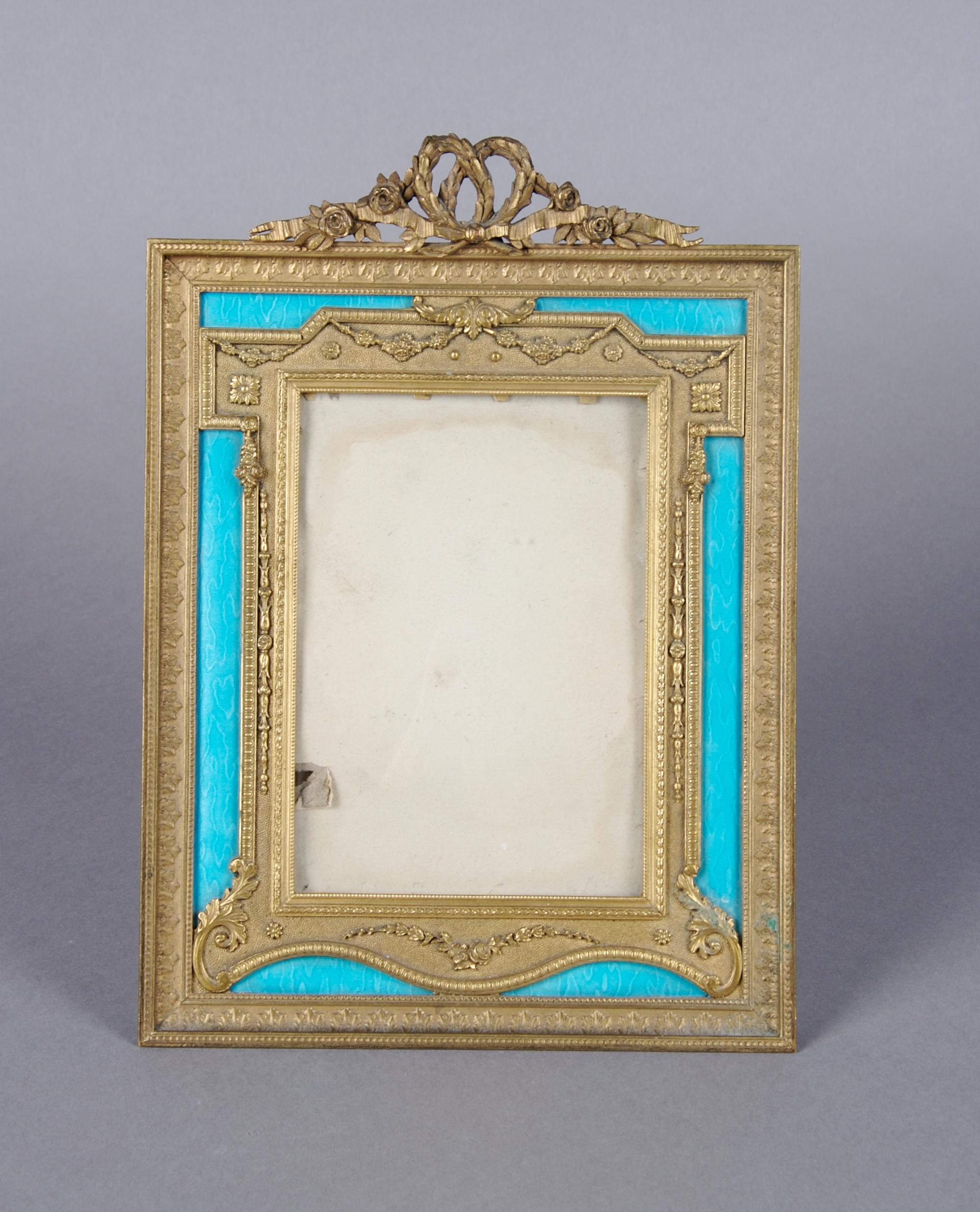 A French Ormolu and Enameled Frame, Height 9 3/4 x width 7 inches.