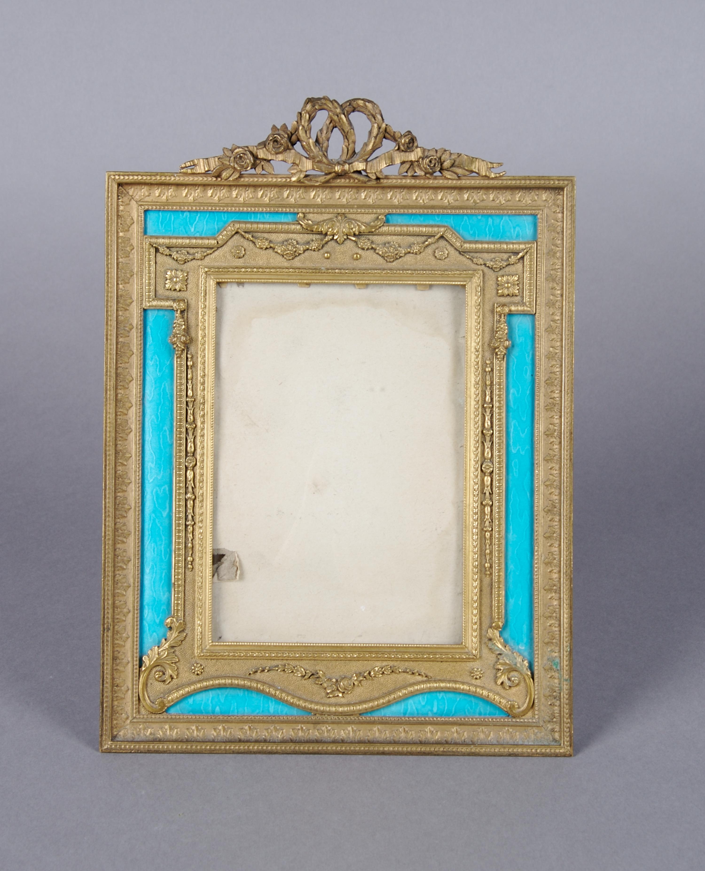 A French Ormolu and Enameled Frame, Height 9 3/4 x width 7 inches.