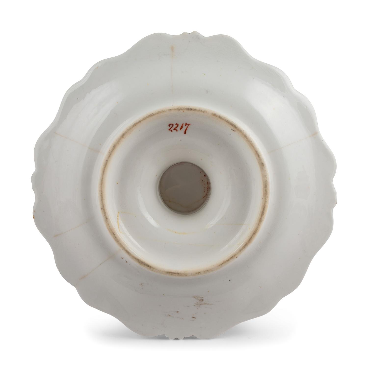 An English Parcel-Gilt and Puce Decorated Porcelain Dinner Service