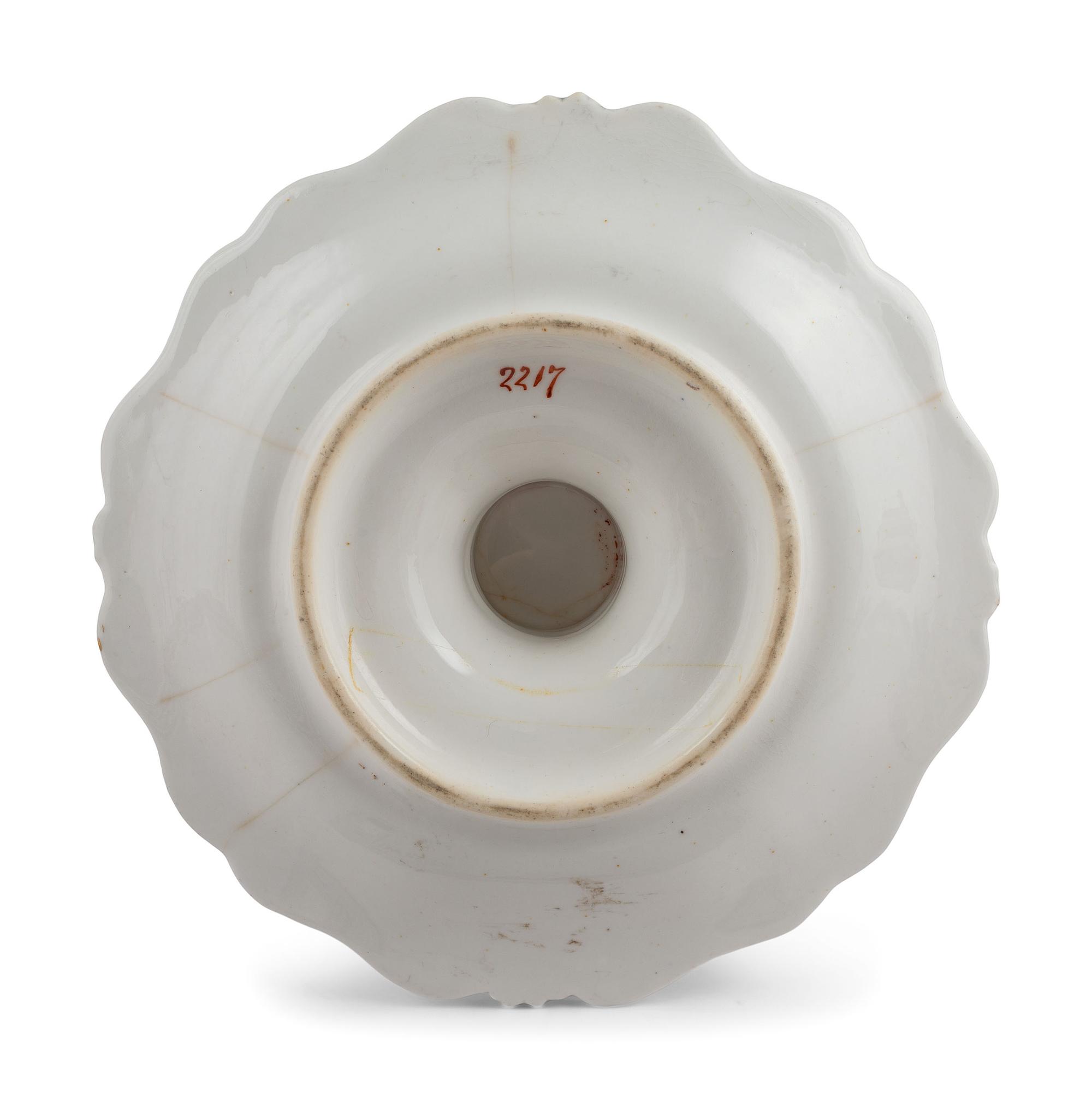 An English Parcel-Gilt and Puce Decorated Porcelain Dinner Service