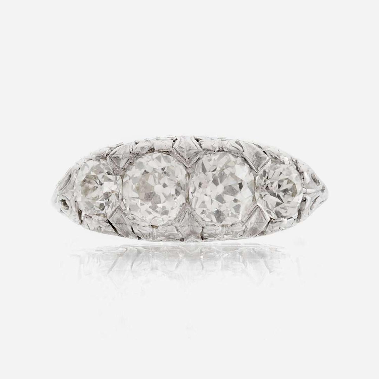 An antique diamond and platinum ring
