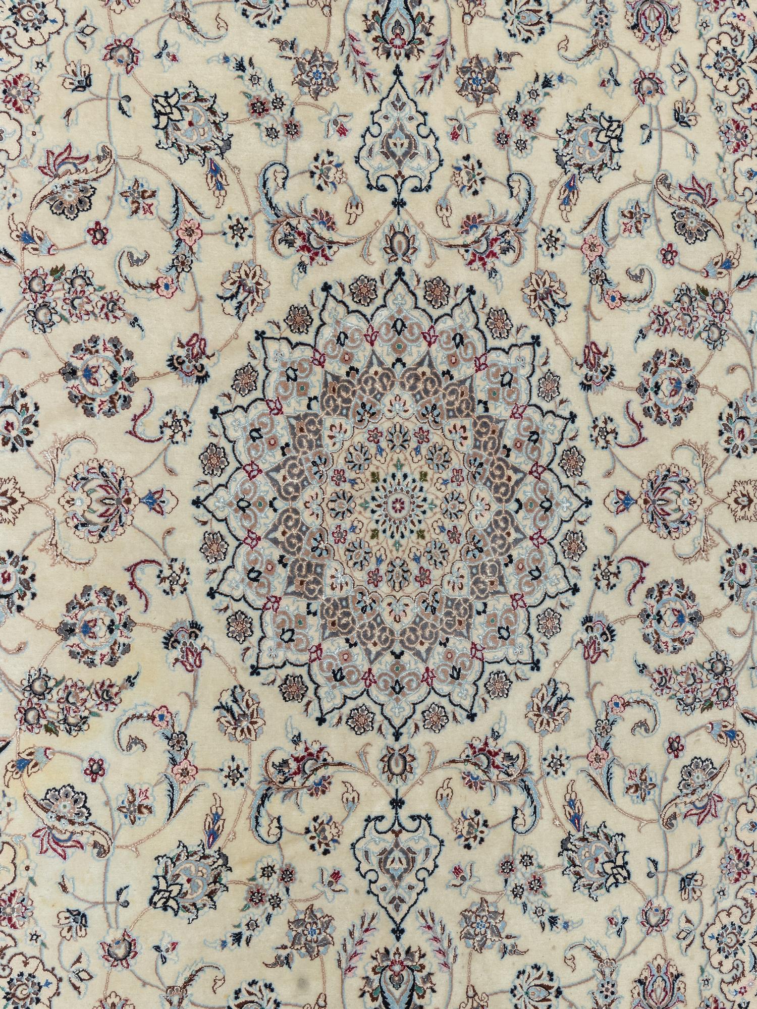 A Nain Silk and Wool Blend Rug