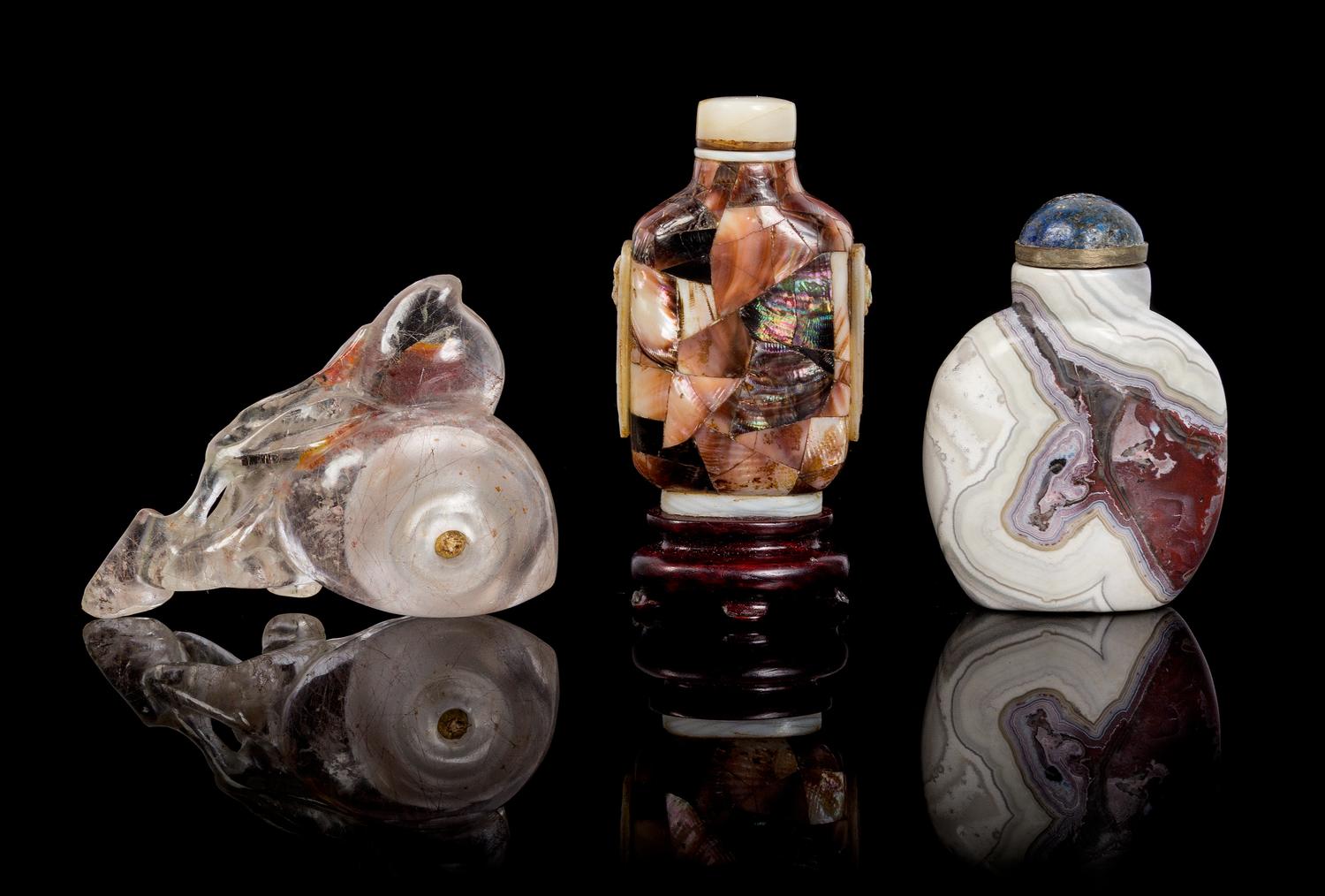 Three Hardstone Snuff Bottles Height of tallest 3 3/8 inches.