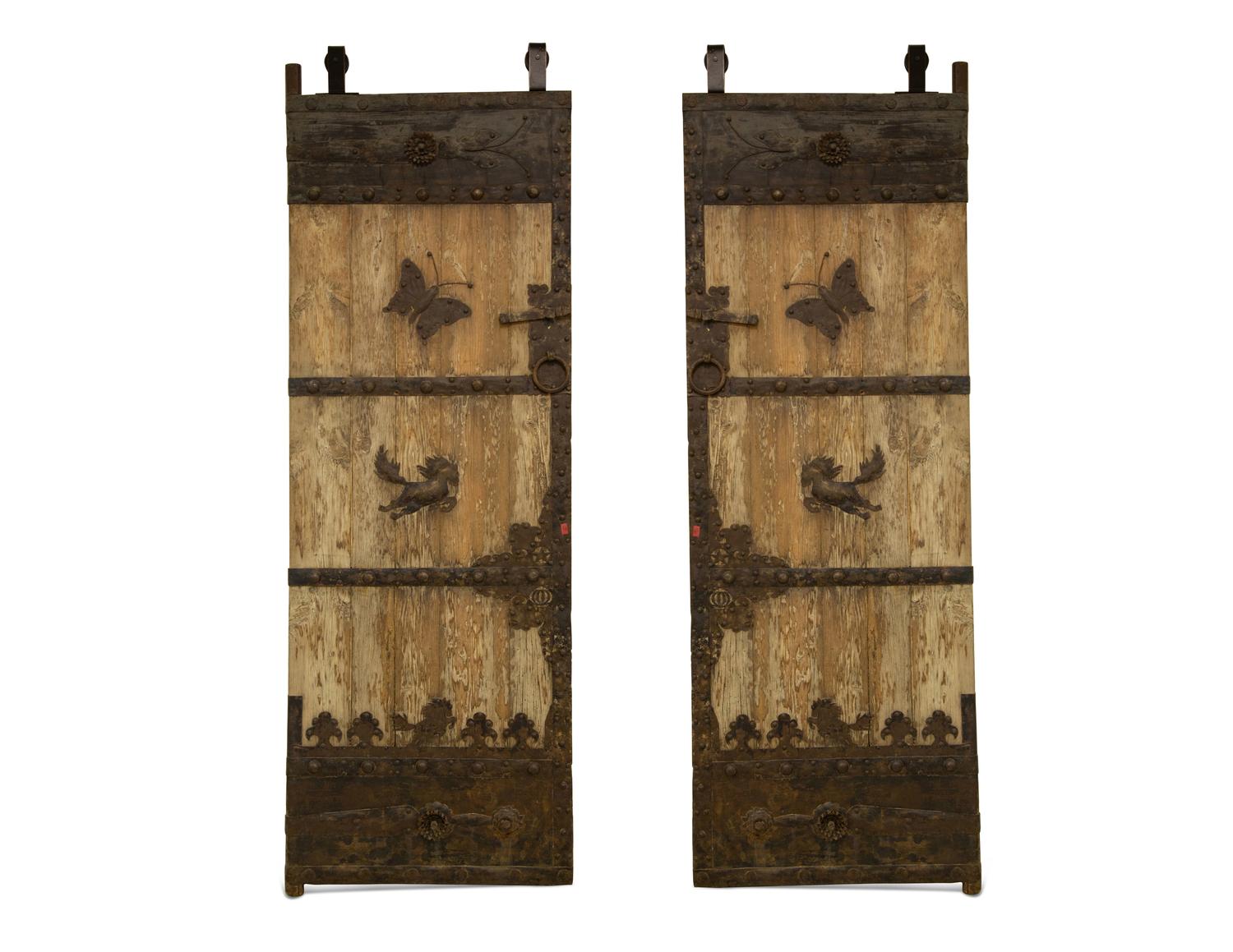 A Pair of Continental Iron Mounted Weathered Oak Doors — 19th Century