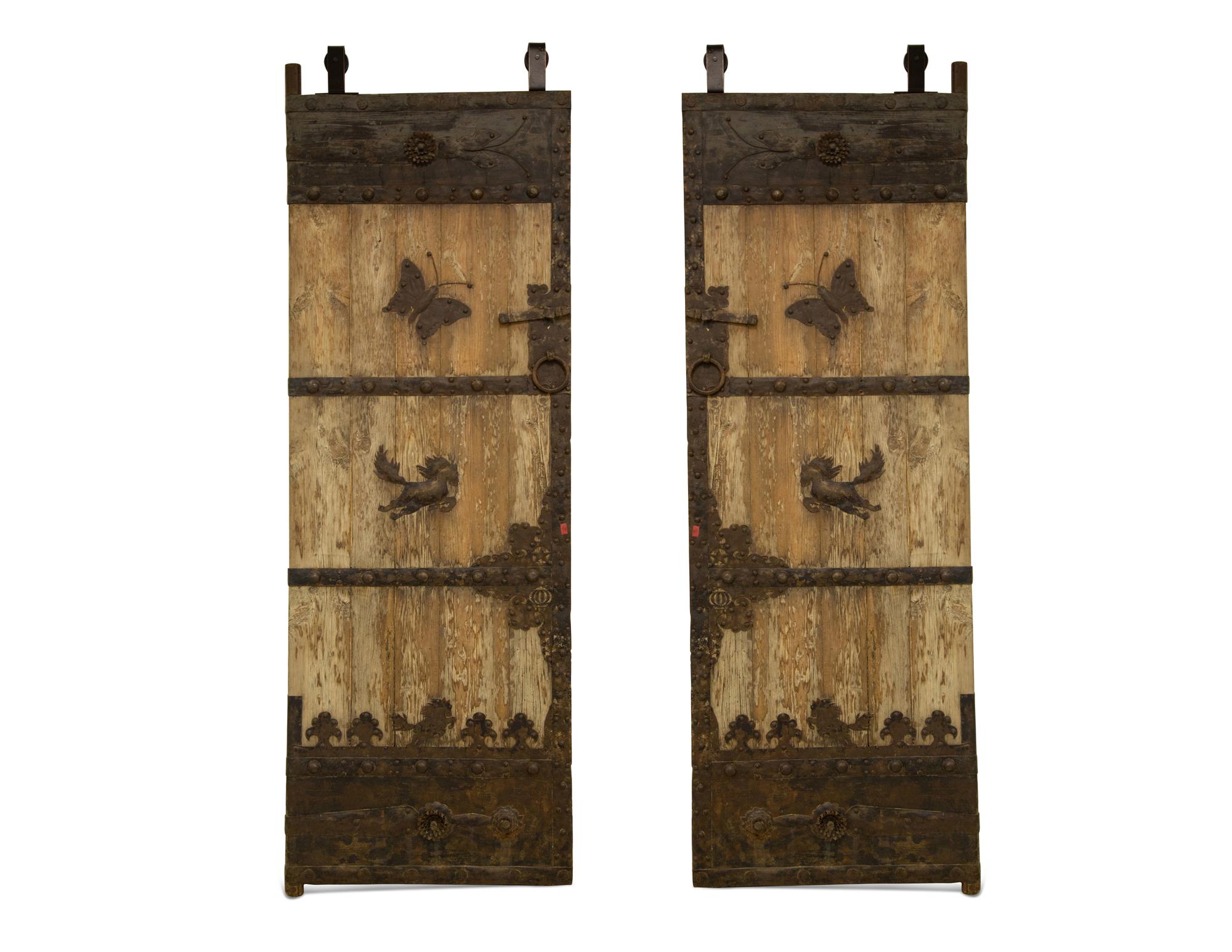 A Pair of Continental Iron Mounted Weathered Oak Doors — 19th Century