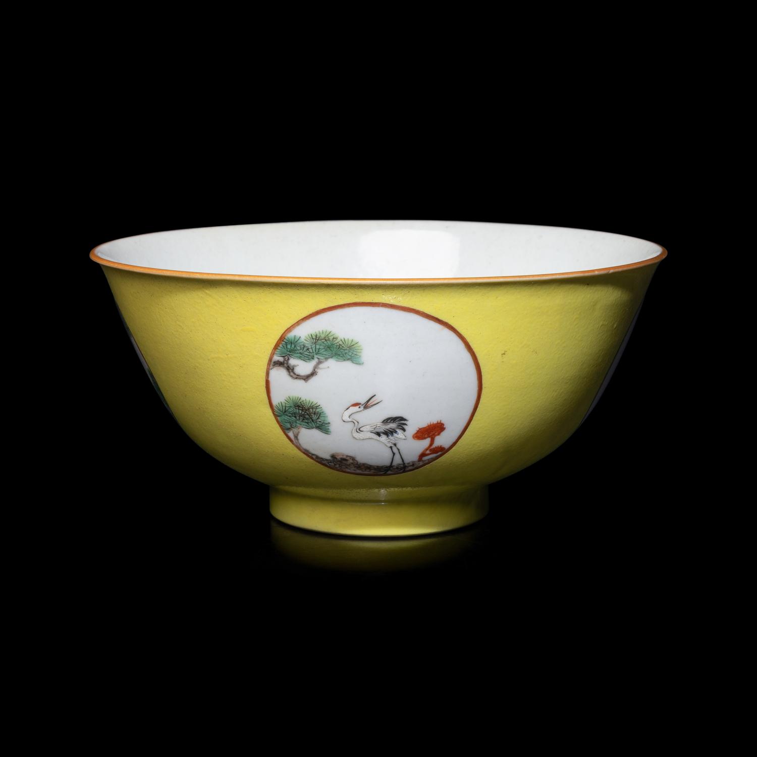 A Chinese Yellow Ground 'Medallion' Porcelain Bowl, Qing Dynasty, 18th Century or Later 清中期 黃地粉彩開光松鶴延年圖碗