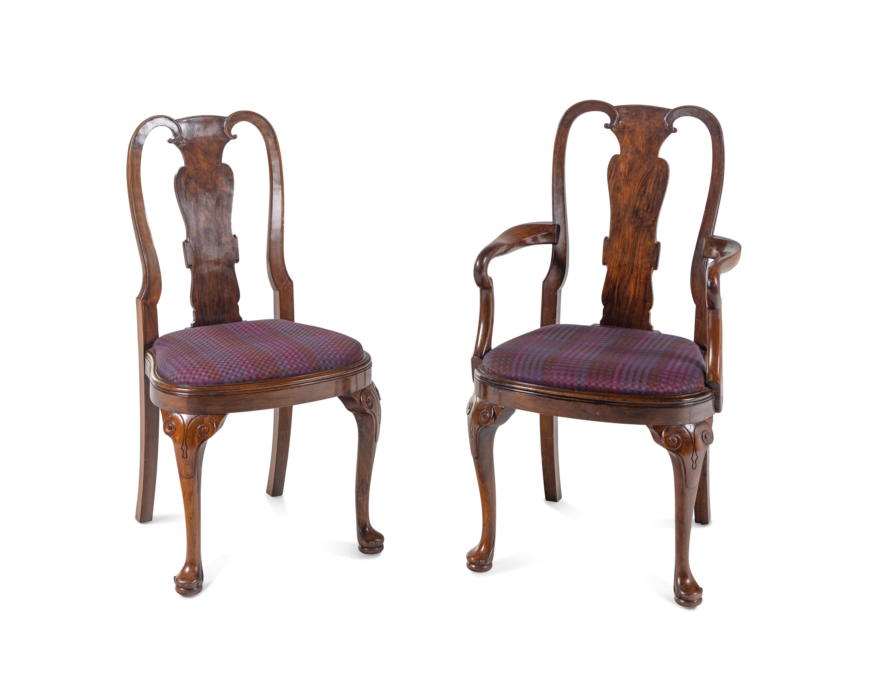 A Set of Eight George I Style Walnut Dining Chairs