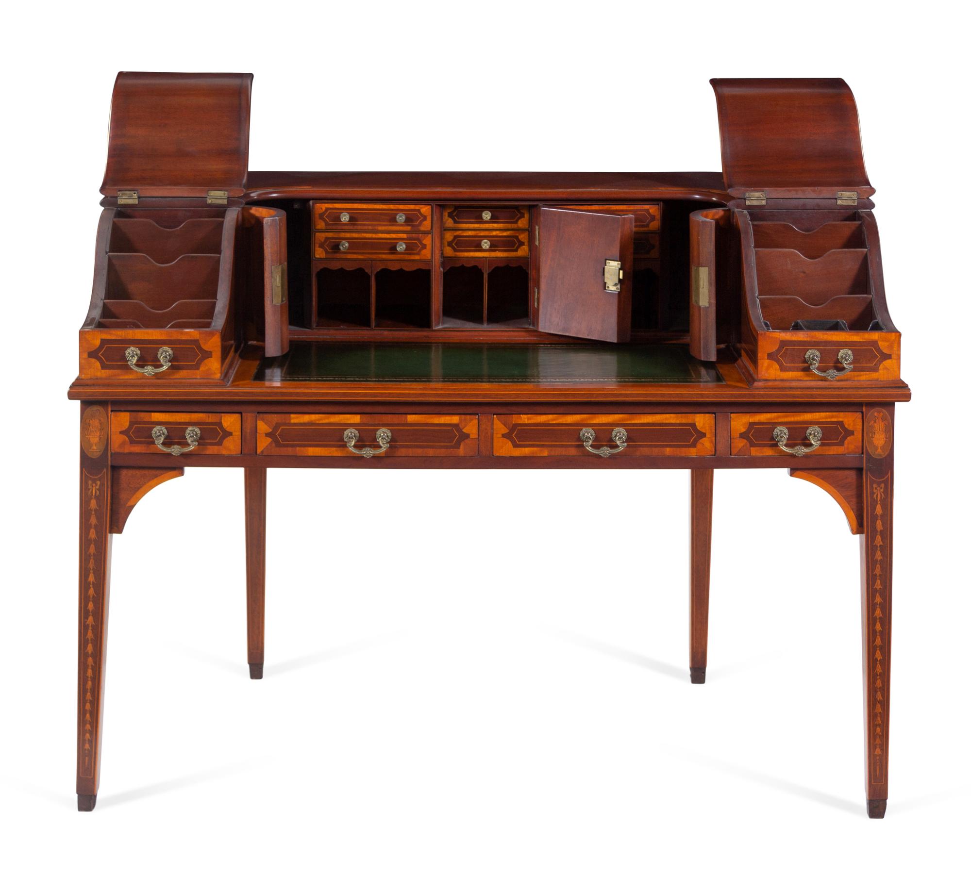 A George III Style Inlaid and Figured Mahogany Leather Inset Carlton House Desk