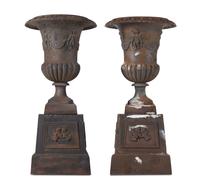 A Pair of Cast Iron Garden Urns