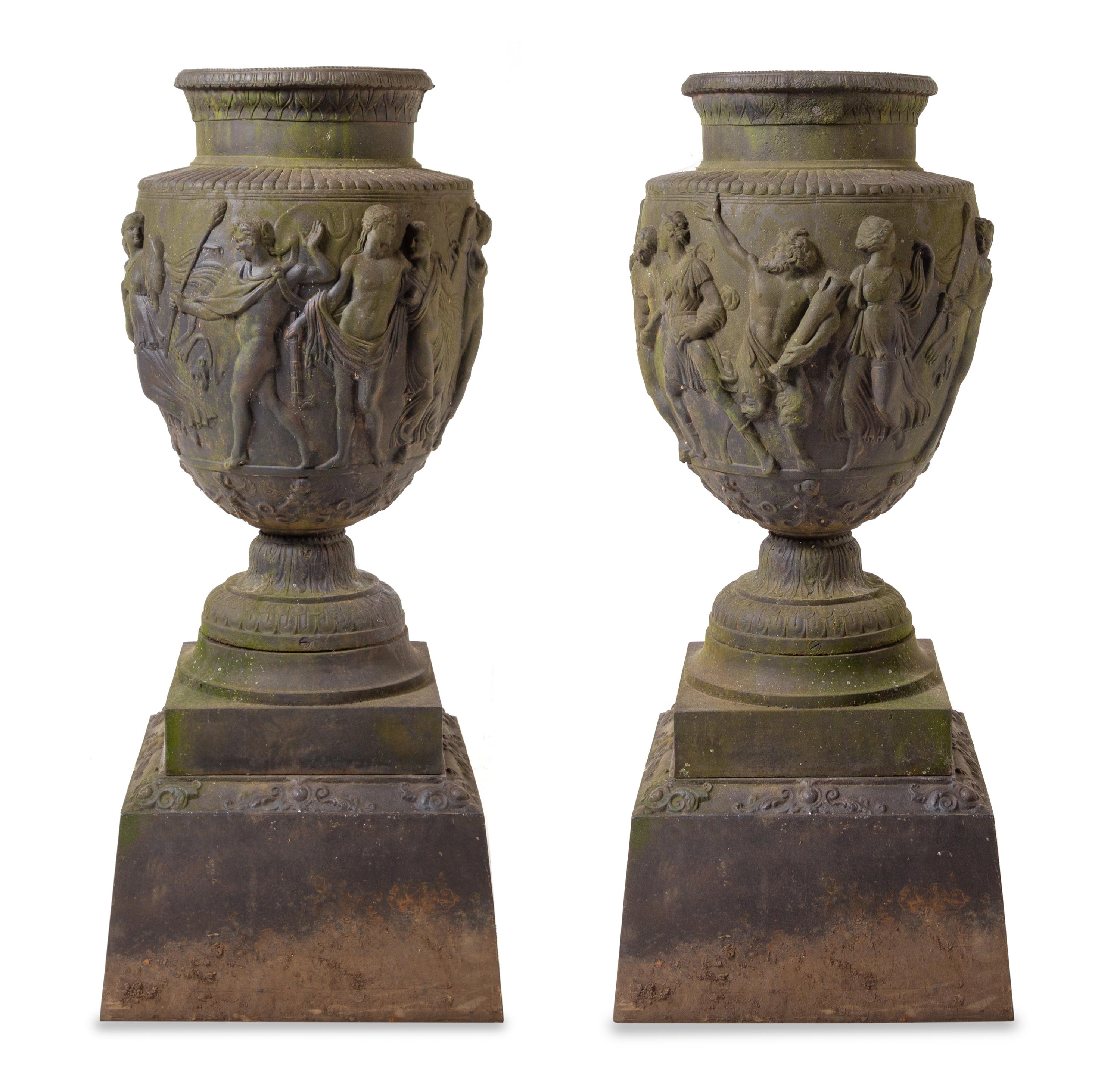 A Pair of Cast Metal Garden Urns Height overall 54 inches. — AFTER THE ANTIQUE, 20TH CENTURY