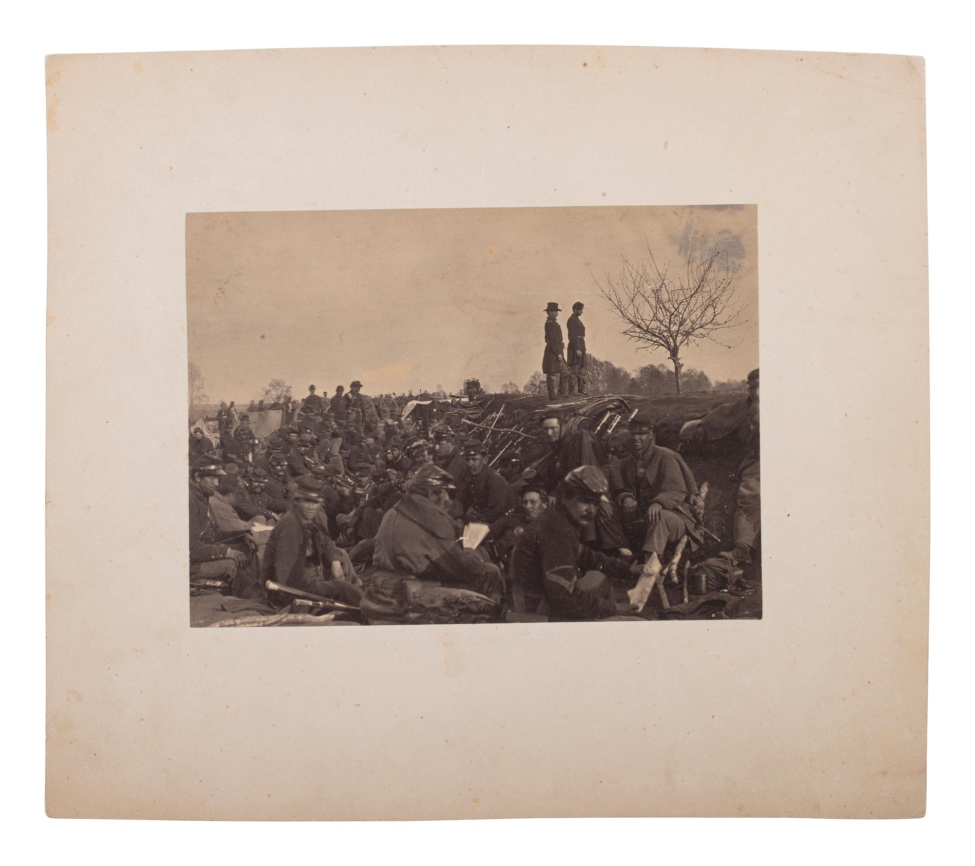 [CIVIL WAR]. [RUSSELL, Andrew J. (1830-1902), photographer.] [ Union soldiers entrenched along the west bank of the Rappahannock River at Fredericksburg, VA .] Ca 1862-63.