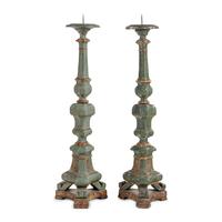An Associated Pair of Italian Baroque Style Painted and Parcel Gilt Floor Prickets