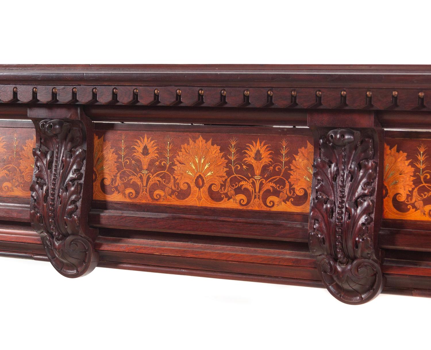 A Herter Brothers Parcel Ebonized and Rosewood Inlaid Walnut Chimneypiece