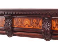A Herter Brothers Parcel Ebonized and Rosewood Inlaid Walnut Chimneypiece