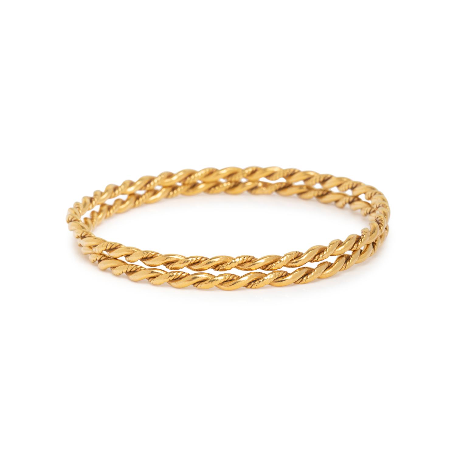 PAIR OF HIGH KARAT GOLD BANGLE BRACELETS