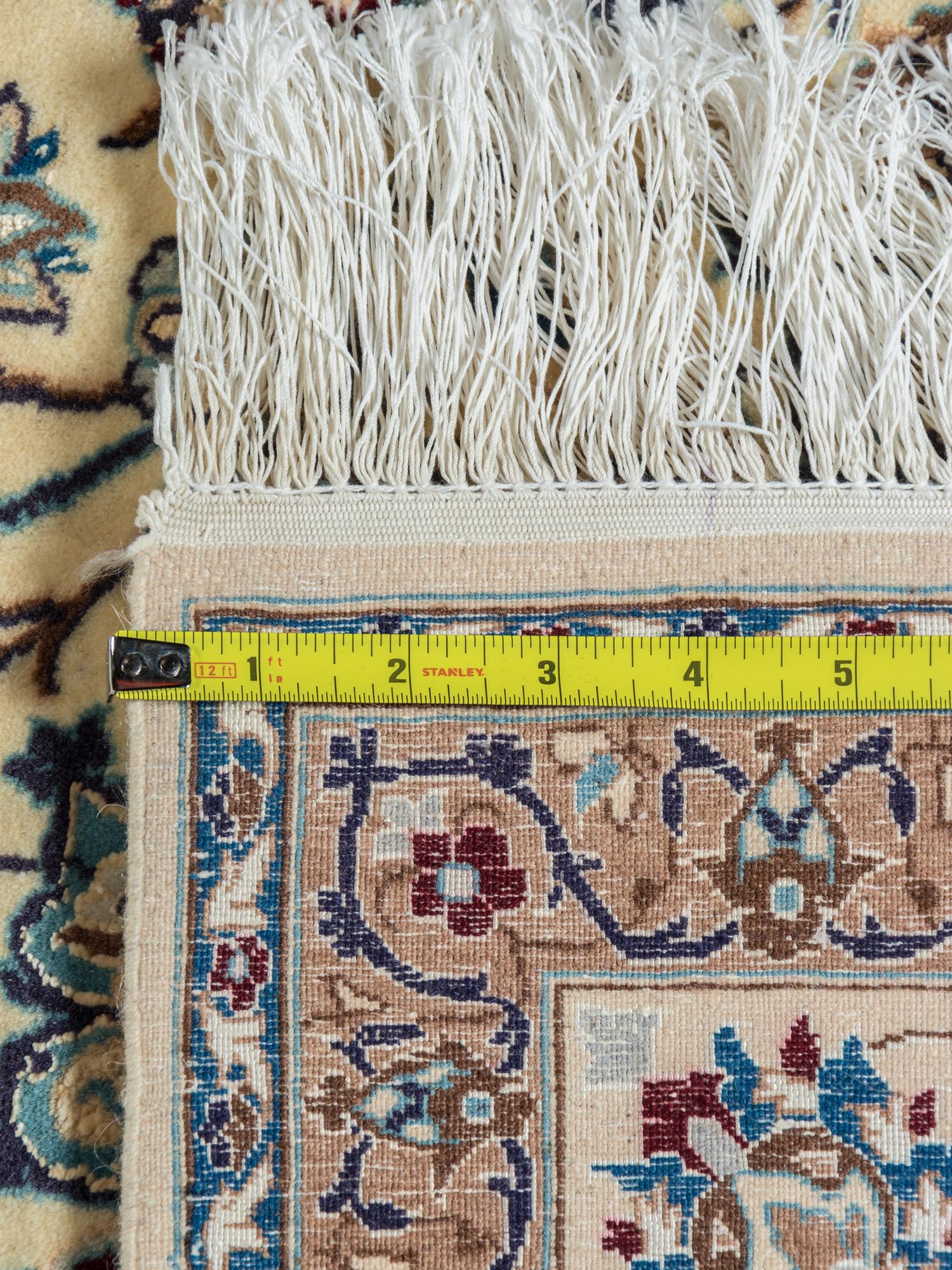 A Nain Silk and Wool Blend Rug