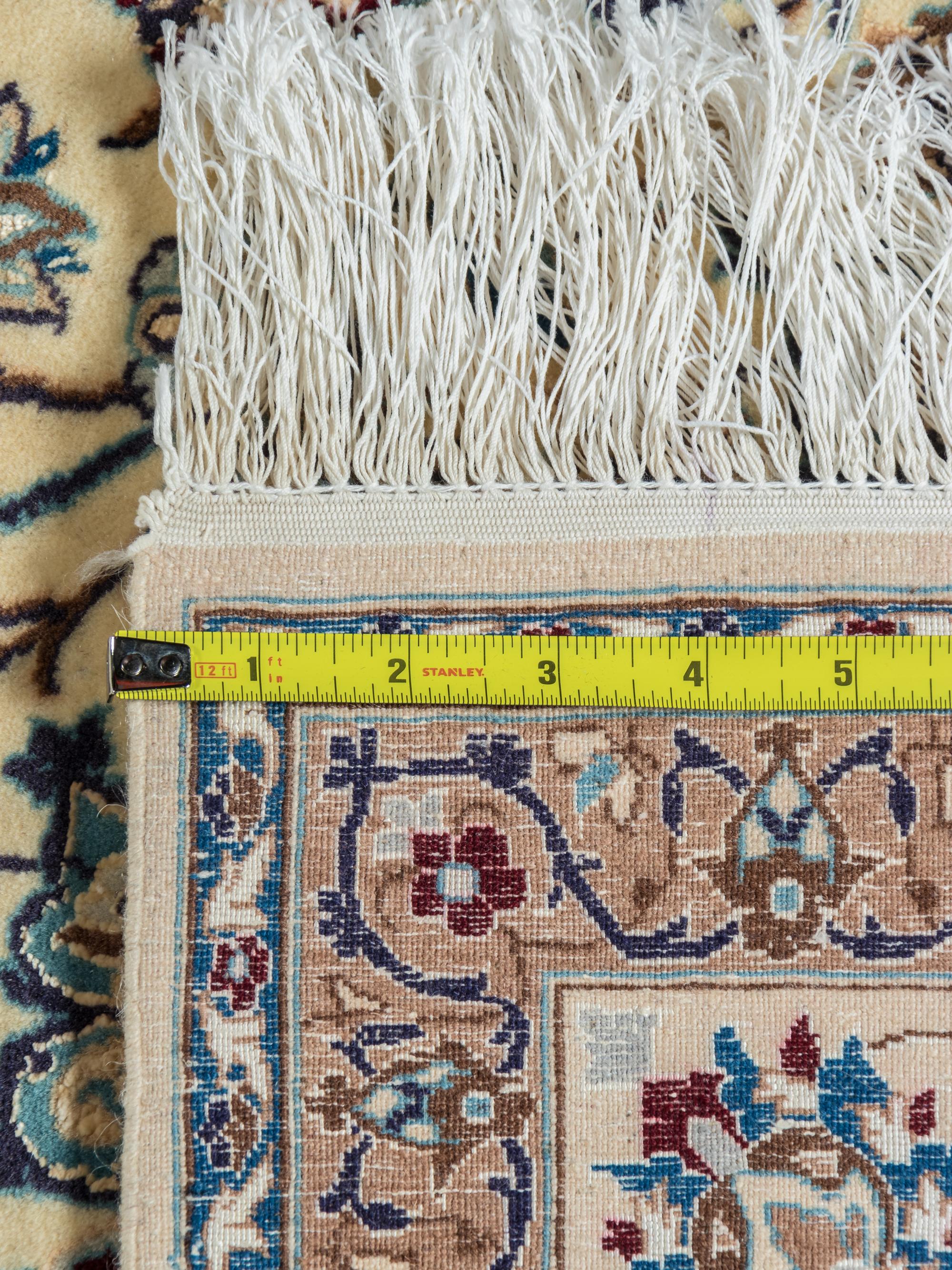 A Nain Silk and Wool Blend Rug