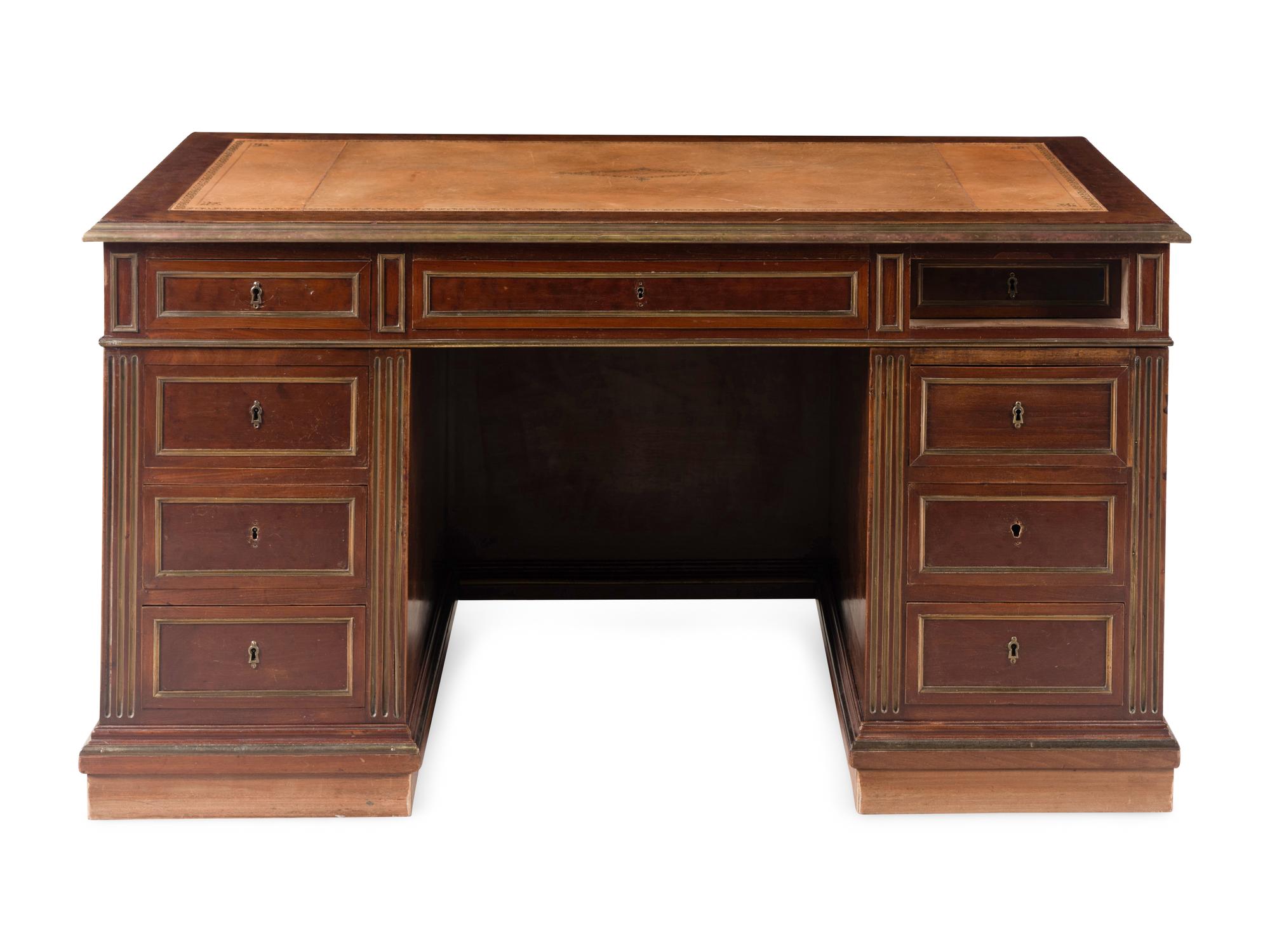 A Directoire Style Brass Mounted Mahogany Pedestal Desk