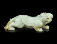 A Chinese Celadon Jade Figure of a Mythical Beast