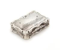 A Victorian Silver Vinaigrette, Maker's Mark W.D., Birmingham, 1851, the lid depicting a view of The Crystal Palace, opening to a scree