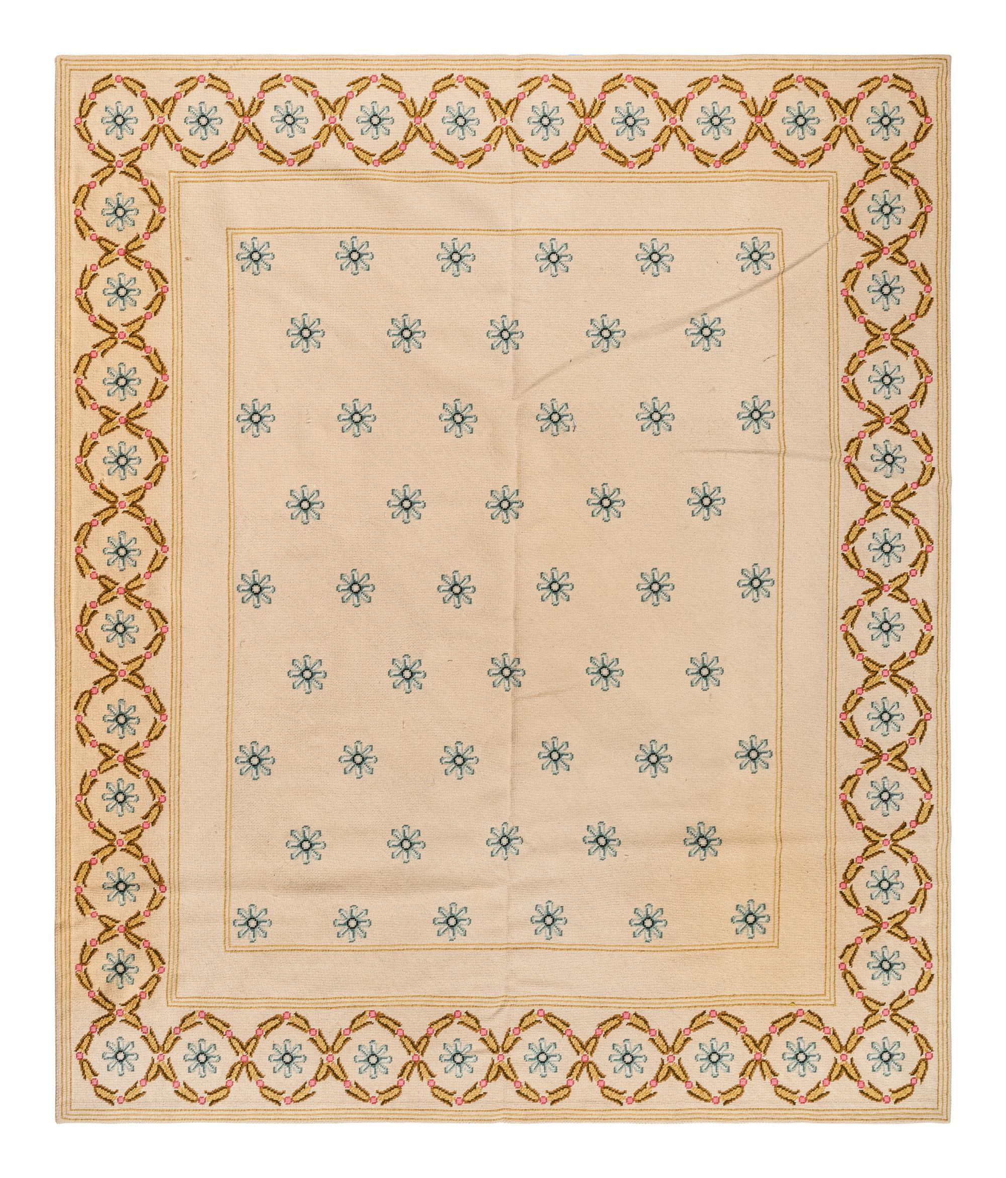A Needlepoint Wool Rug