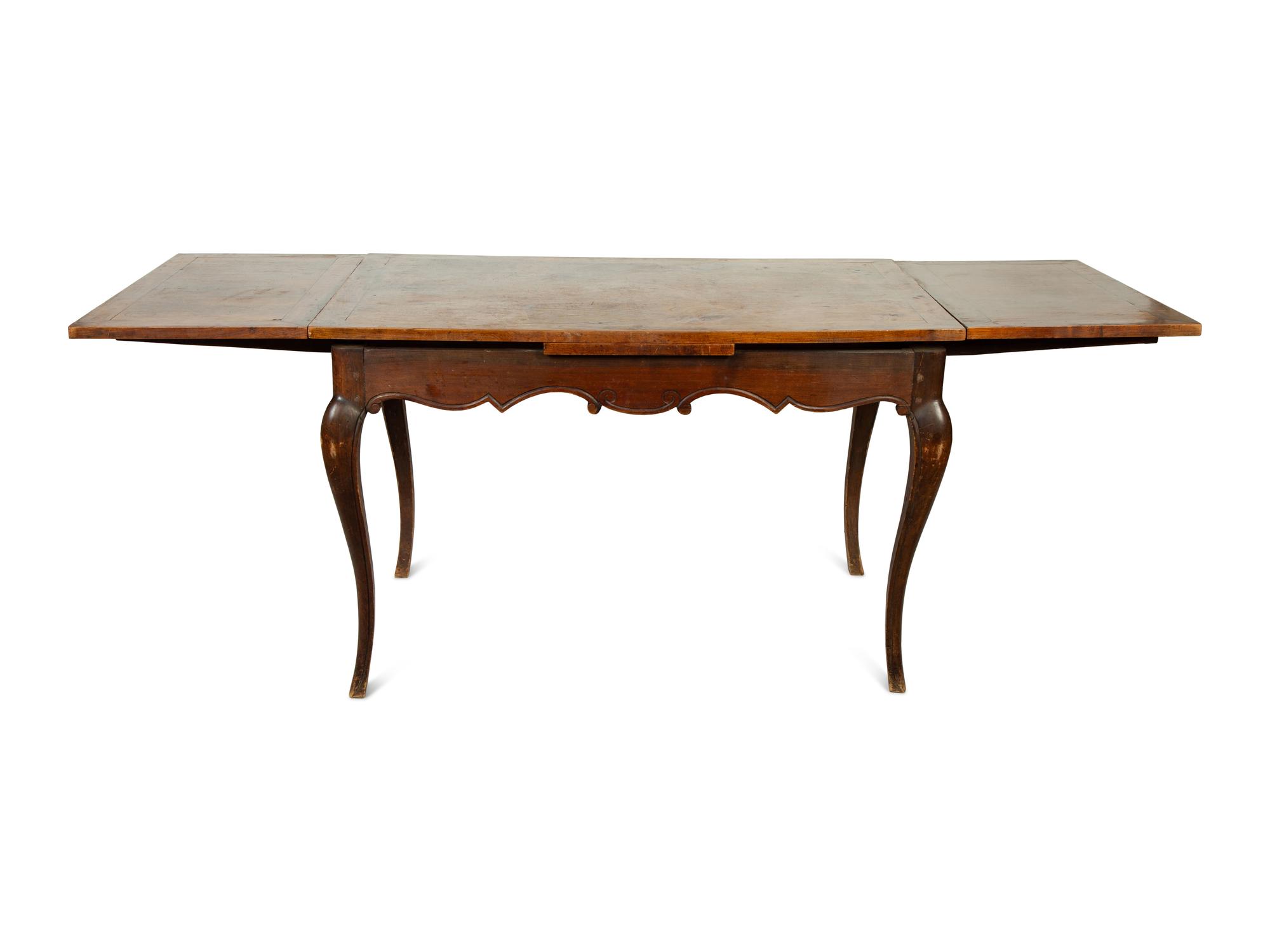 A French Walnut Draw-Leaf Dining Table