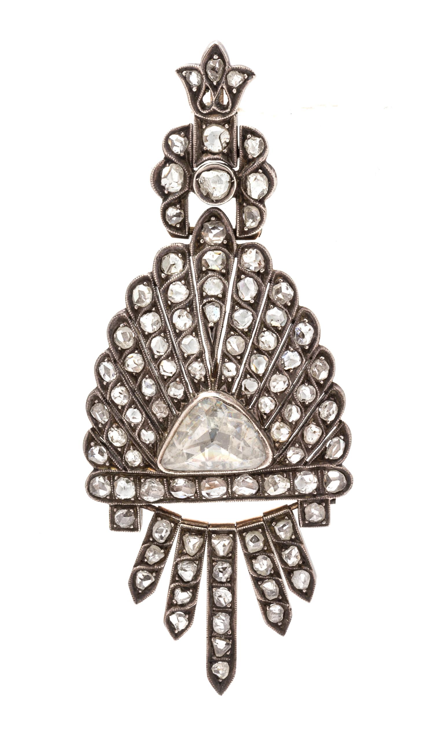 A Silver Topped Gold and Diamond Fringe Pendant, 7.50 dwts.